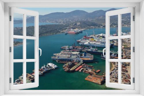 Fototapeta Naklejka Na Ścianę Okno 3D - Aerial drone photo of industrial shipyard in old port of Salamina island, Attica, Greece