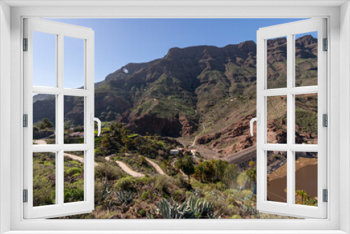 Fototapeta Naklejka Na Ścianę Okno 3D - Barranco con árboles verde en el sur de Gran Canaria