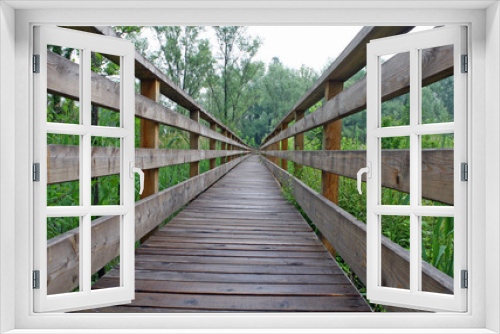 Fototapeta Naklejka Na Ścianę Okno 3D - wooden boardwalk nature trail in a nature park