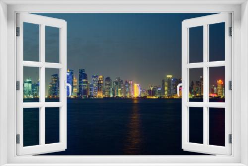 Fototapeta Naklejka Na Ścianę Okno 3D - City light in night view from Doha Qatar