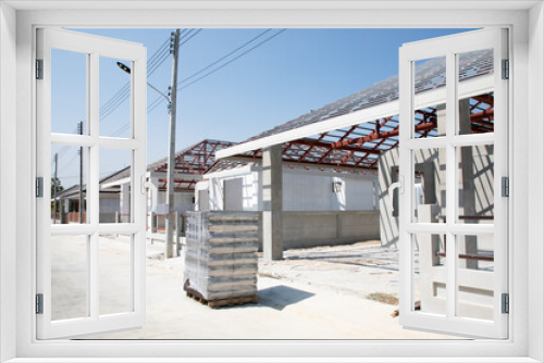 Fototapeta Naklejka Na Ścianę Okno 3D - Home structures being constructed of steel and concrete