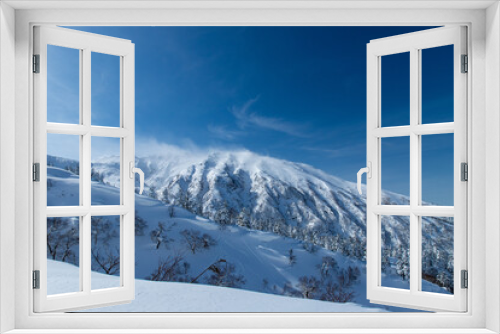 Fototapeta Naklejka Na Ścianę Okno 3D - 北海道　十勝岳連峰の冬の風景