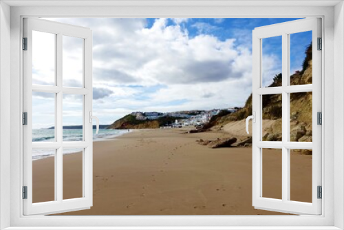 Fototapeta Naklejka Na Ścianę Okno 3D - Winters day with an empty beach at Salema on the Algarve, Portugal