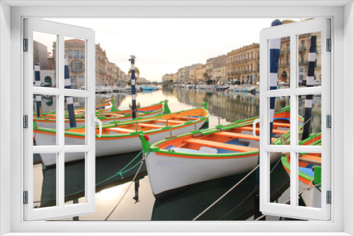 Fototapeta Naklejka Na Ścianę Okno 3D - Colorful traditional wooden boats in Sete, a seaside resort and singular island in the Mediterranean sea, it is named the Venice of Languedoc Rousillon, France
