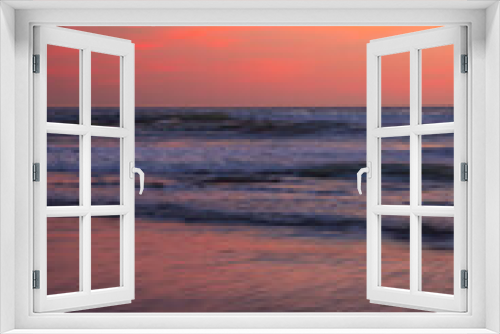 Fototapeta Naklejka Na Ścianę Okno 3D - Pink sunset on the beach. Seascape for background. Colorful sky. Beautiful water reflection. Sunlight on horizon line. Nature and environment concept. Copy space. Sunset in Bali.