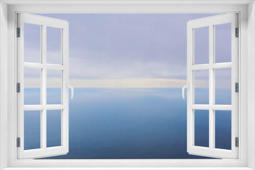 Fototapeta Naklejka Na Ścianę Okno 3D - foggy rainy sea to horizon, bird's eye view
