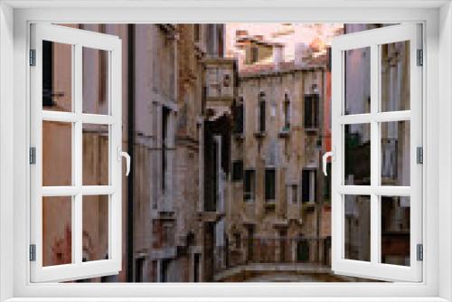 Fototapeta Naklejka Na Ścianę Okno 3D - A shady Venetian backwater and typical Venetian bridge: Rio della Madoneta, San Polo, Venice, Italy