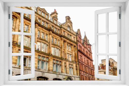 Fototapeta Naklejka Na Ścianę Okno 3D - Buildings and streetside scenery in Liverpool UK around Matthew Street