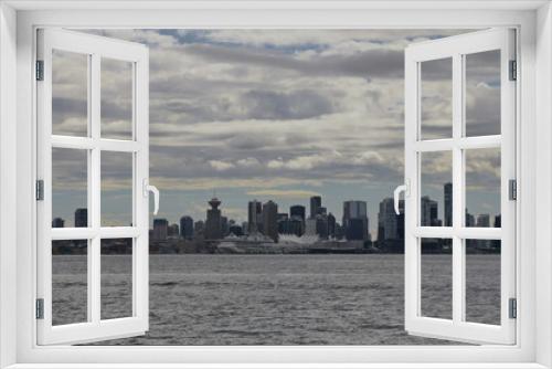 Fototapeta Naklejka Na Ścianę Okno 3D - City Skyline in a cloudy day