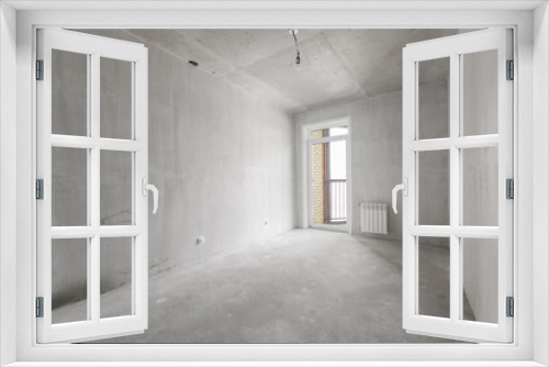 interior of the apartment without decoration in gray colors. rough finish