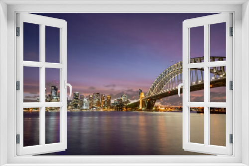 Fototapeta Naklejka Na Ścianę Okno 3D - Beautiful sunset colours over iconic the Sydney Harbour Bridge and skyline.
