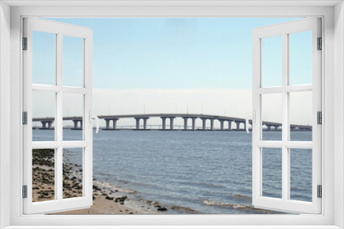 Fototapeta Naklejka Na Ścianę Okno 3D - Bridge Accross Inlet Water Blue Sky