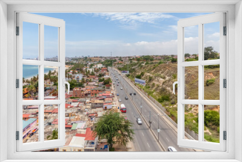 Fototapeta Naklejka Na Ścianę Okno 3D - Aerial view at the samba road in the Luanda city downtown center with road, vehicles and buildings