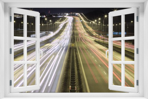 Fototapeta Naklejka Na Ścianę Okno 3D - Time lapse night traffic on highway