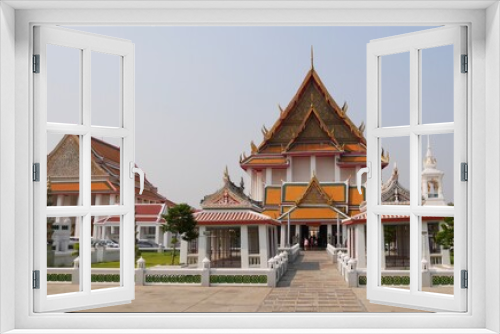 Fototapeta Naklejka Na Ścianę Okno 3D - March 7 2021 - Bangkok, Thailand : Wat Kanlayanamit Woramahawihan Thai temple at the Chao Phraya River, Bangkok, Thailand.
