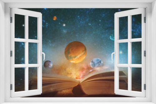 Fototapeta Naklejka Na Ścianę Okno 3D - Book of the universe - opened magic book with planets and galaxies. Elements of this image furnished by NASA