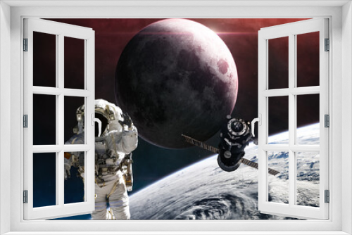 Fototapeta Naklejka Na Ścianę Okno 3D - Astronaut and space station orbiting Earth. Moon. Solar system. Science fiction. Elements of this image furnished by NASA