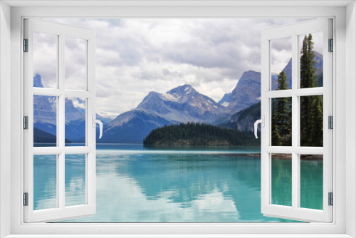Fototapeta Naklejka Na Ścianę Okno 3D - Canada Alberta blue mountain lake on the background of the Rocky Mountains