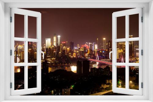 Fototapeta Naklejka Na Ścianę Okno 3D - Night view of high-rise buildings beside the Yangtze River in Chongqing