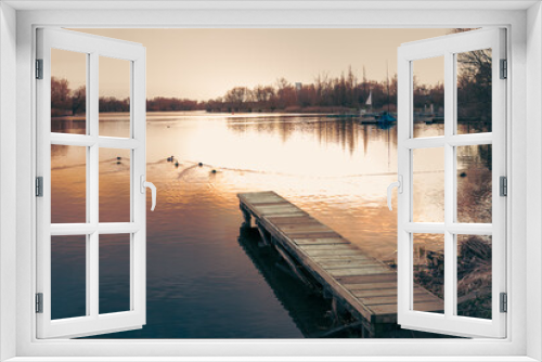 Fototapeta Naklejka Na Ścianę Okno 3D - Steg am See in der Abendsonne