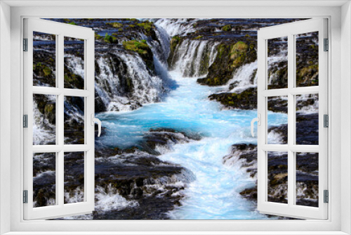 Fototapeta Naklejka Na Ścianę Okno 3D - The beautiful blue Brúarfoss waterfall, Iceland