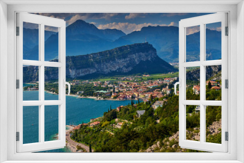 Fototapeta Naklejka Na Ścianę Okno 3D - Panoramic view on Lake Garda from the Busatte-Tempesta trail near Nago-Torbole with the iron staircase,  Torbole  town surrounded by mountains in the summer time,Italy
