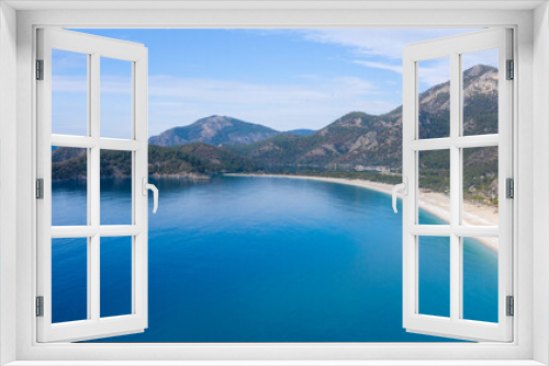 Fototapeta Naklejka Na Ścianę Okno 3D - A fascinating view that has the unique nature of Oludeniz which is a county of Fethiye in Turkey. Because of its warm climate and fresh air, it has been an important destination to visit for tourists.