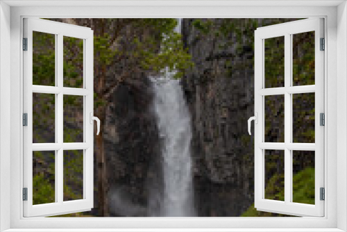 Fototapeta Naklejka Na Ścianę Okno 3D - Nauståfossen is a beautiful waterfall in Todalen Norway. The waterfall has a drop of 110 meters. the area is known for its clean and distinctive environment
