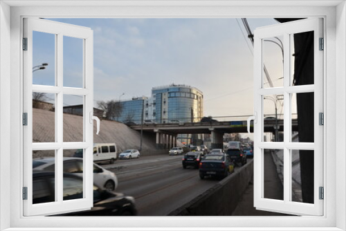 Fototapeta Naklejka Na Ścianę Okno 3D - City traffic under the bridge