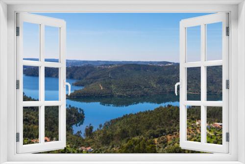 Fototapeta Naklejka Na Ścianę Okno 3D - Landscape view from the lake of  the vacation spot of Castelo de Bode, Portugal. Viewpoint of Fontes with scenic view from the lake