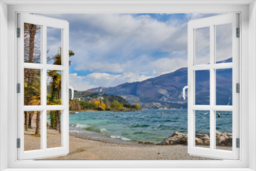 Fototapeta Naklejka Na Ścianę Okno 3D - View of the beautiful Lake Garda surrounded by mountains,Riva del garda and Garda lake in the spring time,Trentino Alto Adige region,italy