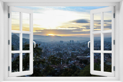 Sunset and Sarajevo. Panorama of the city of Sarajevo during sunset. City of Sarajevo.