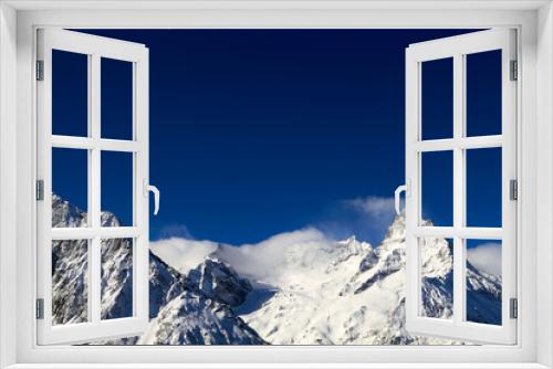Fototapeta Naklejka Na Ścianę Okno 3D - Beautiful snowy mountains and blue sky Dombay Karachay-Cherkessia.