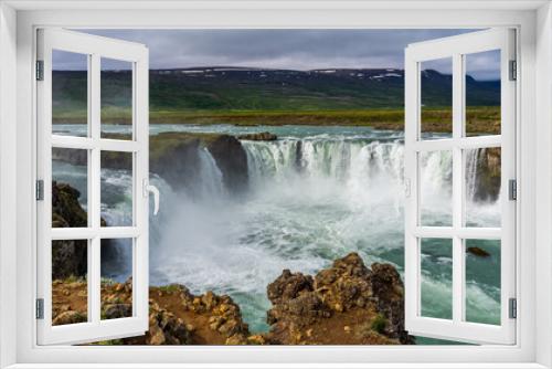 Fototapeta Naklejka Na Ścianę Okno 3D - view of the majestic Godafoss waterfall near the city of Akureyri during summer season 