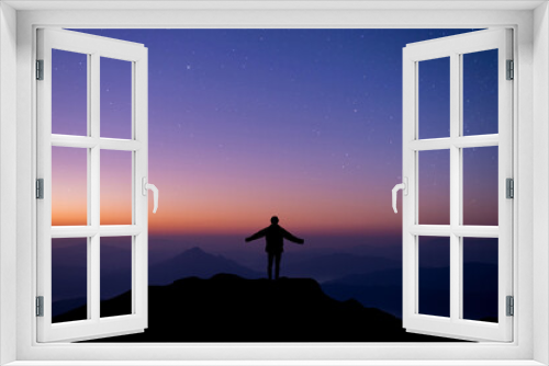 Fototapeta Naklejka Na Ścianę Okno 3D - Silhouette of happy woman open hands against and watched night sky, star and milky way background alone on top of the mountain. People having fun on summer vacation  freedom and imagination concept.