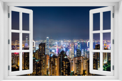 Fototapeta Naklejka Na Ścianę Okno 3D - panoramic night view of Hong Kong from the Victoria peak in Hong Kong.