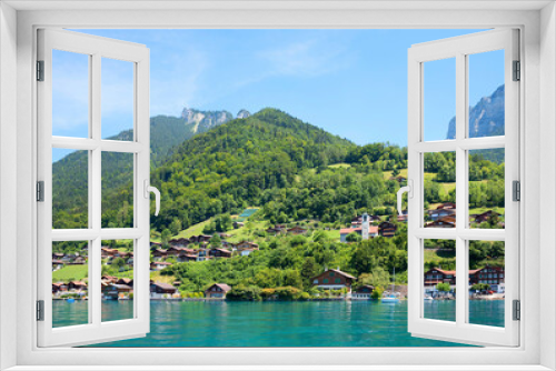 Fototapeta Naklejka Na Ścianę Okno 3D - beautiful tourist resort Merligen, lake shore of Thunersee, Berner Oberland, switzerland