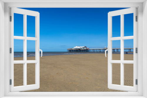Fototapeta Naklejka Na Ścianę Okno 3D - Blackpool pier and an empty beach during the covid lockdown at lowtide
