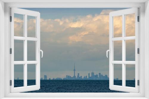 Fototapeta Naklejka Na Ścianę Okno 3D - Toronto city from the other side of the lake Ontario