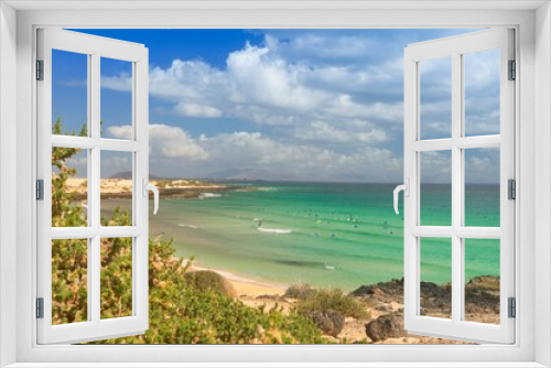 Fototapeta Naklejka Na Ścianę Okno 3D - Wellensurfer an der Playa El Moro / Playa Alzada auf Fuerteventura  (Moro / Alzada Beach) 