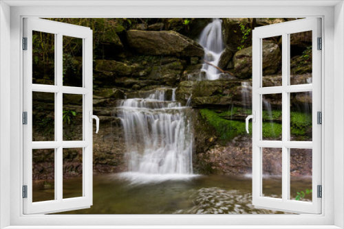 Fototapeta Naklejka Na Ścianę Okno 3D - Spring waterfall in La Garrotxa, Girona, Spain