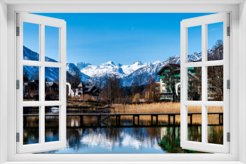 Fototapeta Naklejka Na Ścianę Okno 3D - Idyllic View on Altausseer Lake with Dachstein Mountains in the Back