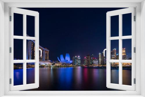 Fototapeta Naklejka Na Ścianę Okno 3D - Night view at Singapore Marina Bay Area.