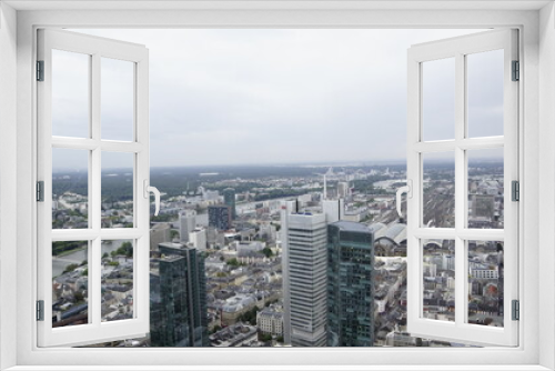 Fototapeta Naklejka Na Ścianę Okno 3D - Blick vom Maintower auf die Innenstadt mit den Hochhäusern und den Bahnhof von Frankfurt