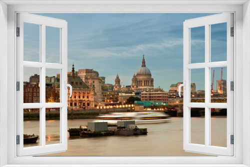 London, panoramic aerial view over Thames river with St. Paul Cathedral, skyscapers of City and skyline.