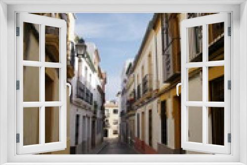 Fototapeta Naklejka Na Ścianę Okno 3D - Street view with old buildings, Majestic and old facades in Cordoba city, Spain.