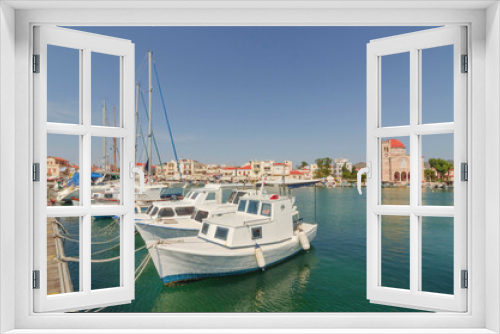 Fototapeta Naklejka Na Ścianę Okno 3D - Port of charming Aegina town with yachts and fishermen boats docked in Aegina island, Saronic gulf, Greece, in a sunny summer morning