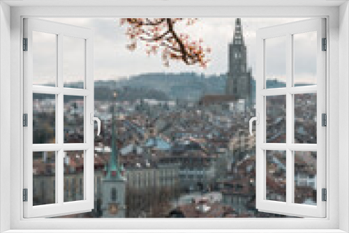 Fototapeta Naklejka Na Ścianę Okno 3D - cherry blossom branch in front of the oldtown of Bern