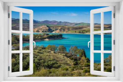Fototapeta Naklejka Na Ścianę Okno 3D - View on the turquoise water of the Guadalhorce and Guadalteba Reservoirs, two artificial lakes in the andalusian backcountry in Spain