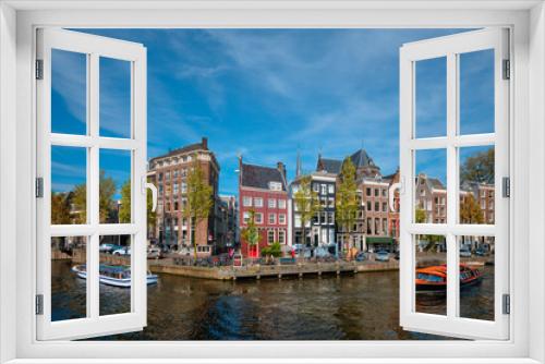 Fototapeta Naklejka Na Ścianę Okno 3D - Amsterdam view - canal with boad, bridge and old houses